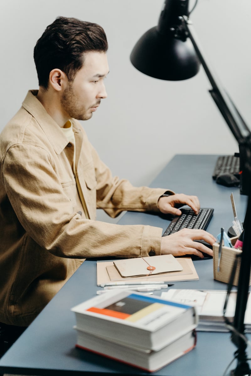 A Man Sitting at the Table